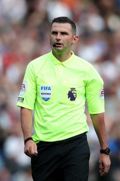Referee Michael Oliver looks on during the Premier League match between Burnley and Leeds United at Turf Moor on August 29, 2021 in Burnley, England.