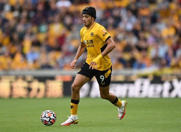 Raul Jimenez of Wolverhampton Wanderers runs with the ball during the Premier League match between Wolverhampton Wanderers and Manchester United at...