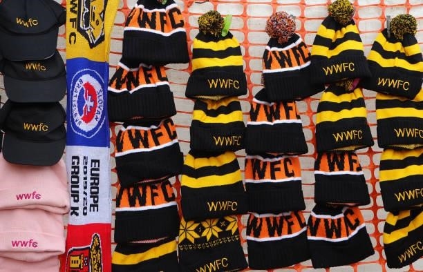 Wolverhampton Wanderers hats are seen outside Molineux prior to the Premier League match between Wolverhampton Wanderers and Manchester United at...