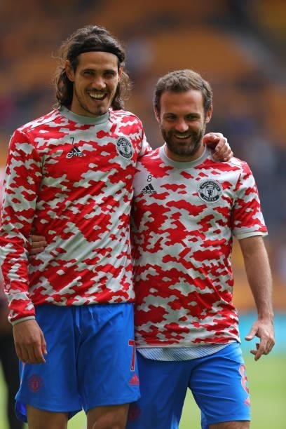 Edinson Cavani and Juan Mata of Manchester United during a warm up prior to the Premier League match between Wolverhampton Wanderers and Manchester...