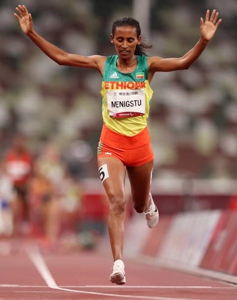 Tigist Gezahagn Menigstu of Team Ethiopia celebrates after winning gold in the Women's 1500m - T13 Final on day 4 of the Tokyo 2020 Paralympic Games...