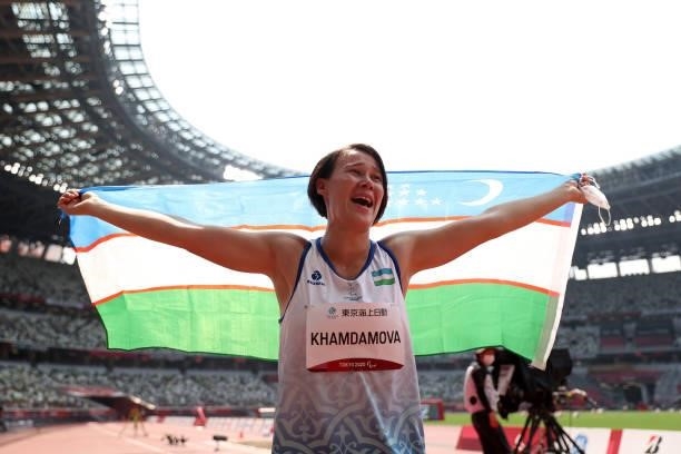 Mokhigul Khamdamova of Team Uzbekistan celebrates after winning the Gold medal in the Women's Discus Final on day 4 of the Tokyo 2020 Paralympic...