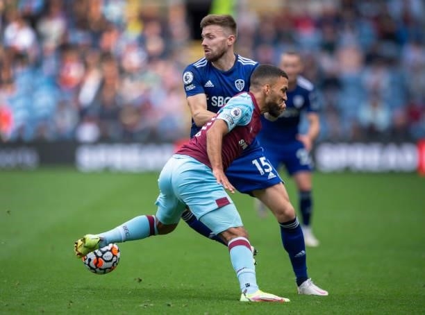 Aaron Lennon of Burnley and Stuart Dallas of Leeds United in action during the Premier League match between Burnley and Leeds United at Turf Moor on...