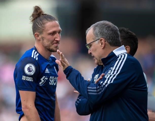 Leeds United manager Marcelo Bielsa talks with Luke Ayling of Leeds United during the Premier League match between Burnley and Leeds United at Turf...