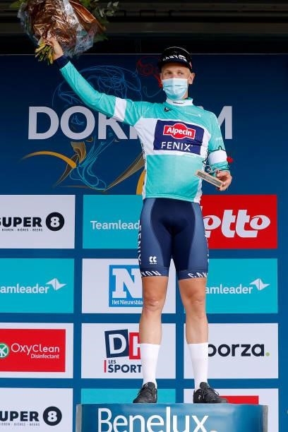 Tim Merlier of Belgium and Team Alpecin-Fenix celebrates winning the turquoise points jersey on the podium ceremony after the 17th Benelux Tour 2021,...