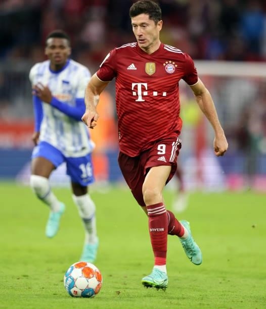 Robert Lewandowski of Bayern Muenchen runs with the ball during the Bundesliga match between FC Bayern München and Hertha BSC at Allianz Arena on...