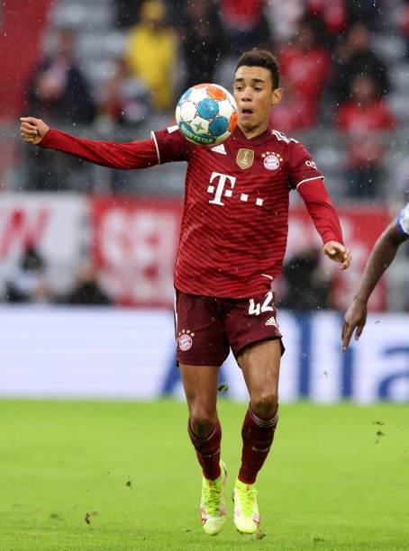 Jamal Musiala of Bayern Muenchen runs with the ball during the Bundesliga match between FC Bayern München and Hertha BSC at Allianz Arena on August...
