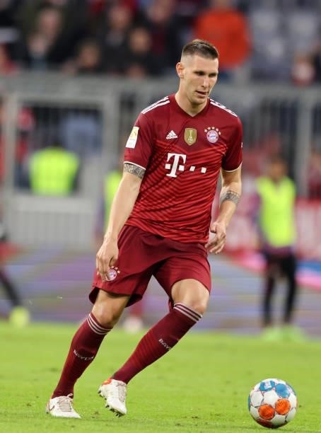 Niklas Suele of FC Bayern Muenchen runs with the ball during the Bundesliga match between FC Bayern München and Hertha BSC at Allianz Arena on August...