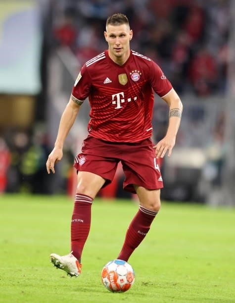 Niklas Suele of FC Bayern Muenchen runs with the ball during the Bundesliga match between FC Bayern München and Hertha BSC at Allianz Arena on August...