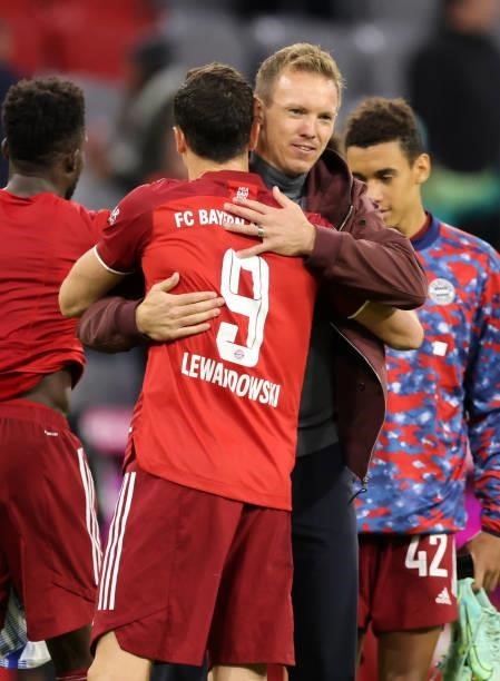 Coach Julian Nagelsmann of Bayern Muenchen and Robert Lewandowski of Bayern Muenchen after the Bundesliga match between FC Bayern München and Hertha...