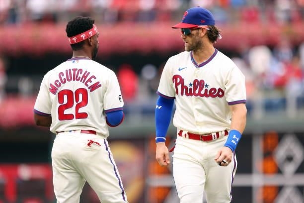 Andrew McCutchen and Bryce Harper of the Philadelphia Phillies before a game against the Arizona Diamondbacks at Citizens Bank Park on August 29,...
