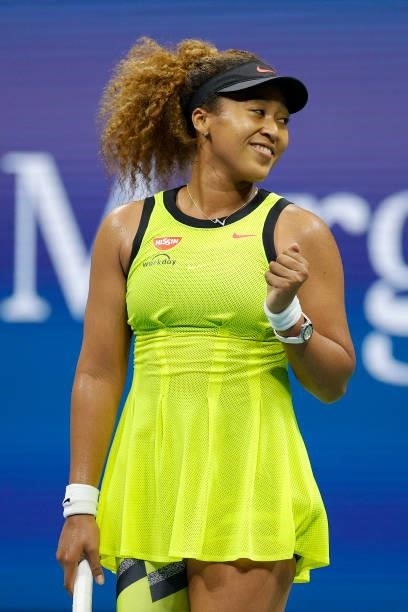 Naomi Osaka of Japan celebrates against Marie Bouzkova of the Czech Republic during their Women's Singles first round match on Day One of the 2021 US...