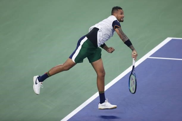 Nick Kyrgios of Australia serves the ball against Roberto Bautista Agut of Spain during their Men's Singles first round match on Day One of the 2021...