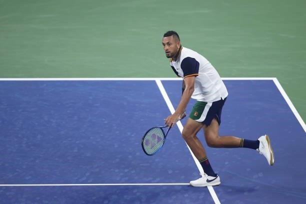 Nick Kyrgios of Australia lunges to return the ball against Roberto Bautista Agut of Spain during their Men's Singles first round match on Day One of...