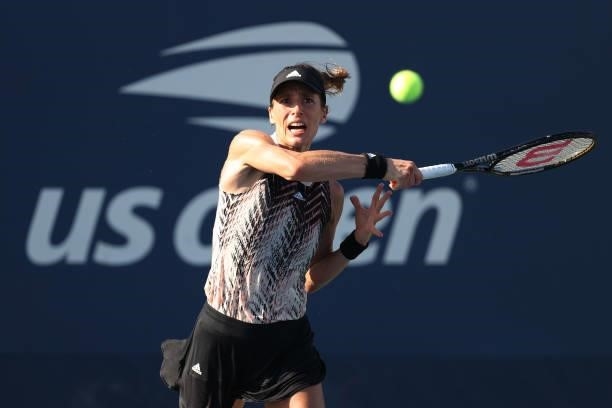 Andrea Petkovic of Germany returns against Irina-Camelia Begu of Romania during their women's singles first round match on Day One of the 2021 US...