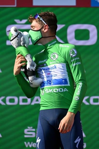 Fabio Jakobsen of Netherlands and Team Deceuninck - Quick-Step celebrates winning the Green Points Jersey and kissing the mascot on the podium...