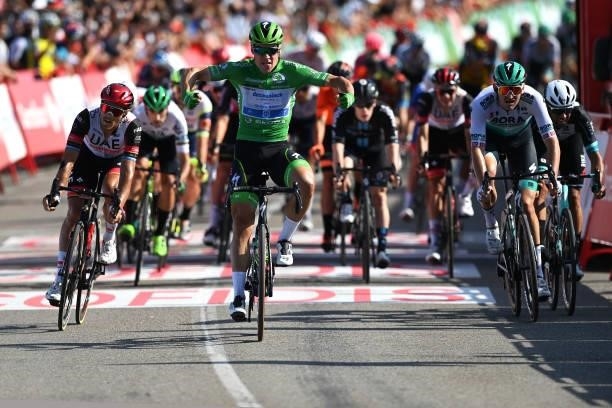 Fabio Jakobsen of Netherlands and Team Deceuninck - Quick-Step Green Points Jersey celebrates at finish line as stage winner ahead of Matteo Trentin...