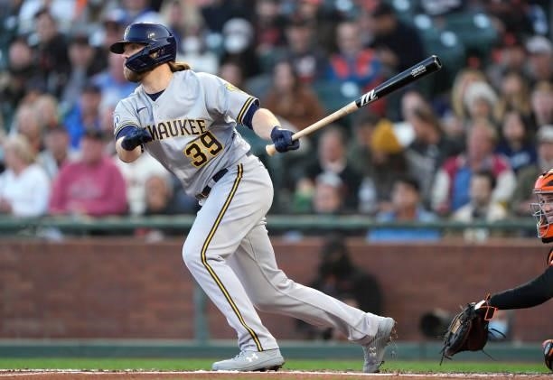 Corbin Burnes of the Milwaukee Brewers hits an RBI single scoring Jace Peterson against the San Francisco Giants in the top of the second inning at...