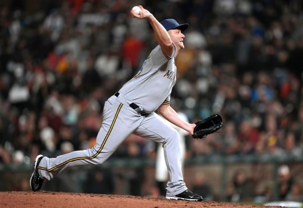 Brad Boxberger of the Milwaukee Brewers pitches against the San Francisco Giants in the bottom of the seventh inning at Oracle Park on August 30,...