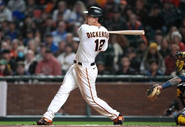 Alex Dickerson of the San Francisco Giants bats against the Milwaukee Brewers in the bottom of the seventh inning at Oracle Park on August 30, 2021...