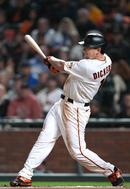Alex Dickerson of the San Francisco Giants bats against the Milwaukee Brewers in the bottom of the seventh inning at Oracle Park on August 30, 2021...