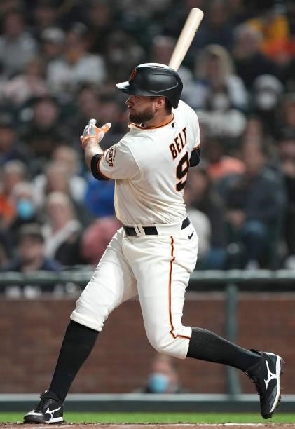 Brandon Belt of the San Francisco Giants bats against the Milwaukee Brewers in the bottom of the eighth inning at Oracle Park on August 30, 2021 in...