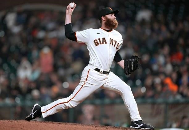 John Brebbia of the San Francisco Giants pitches against the Milwaukee Brewers in the top of the ninth inning at Oracle Park on August 30, 2021 in...