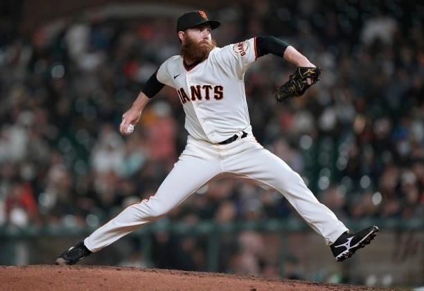 John Brebbia of the San Francisco Giants pitches against the Milwaukee Brewers in the top of the ninth inning at Oracle Park on August 30, 2021 in...