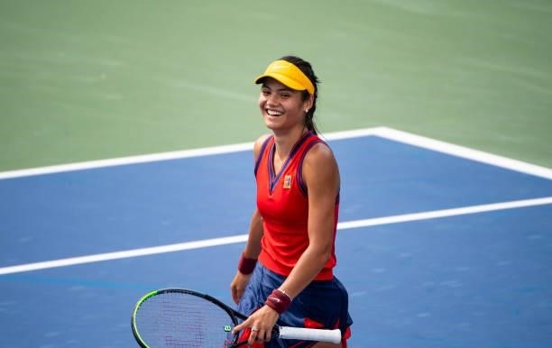 Emma Raducanu of Great Britain celebrates her victory over Stephanie Voegele of Switzerland in the first round of the women's singles of the US Open...