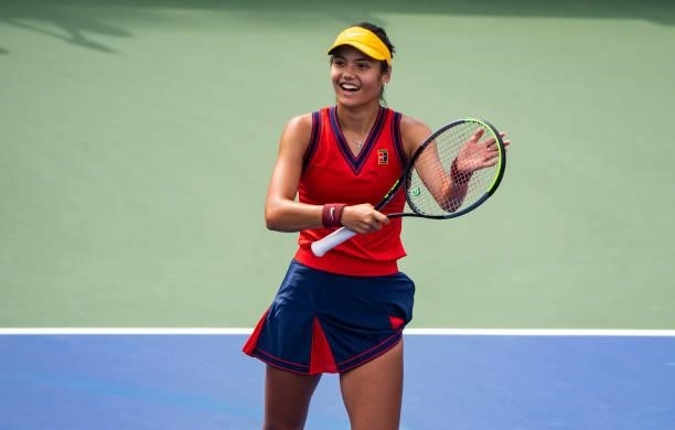 Emma Raducanu of Great Britain celebrates her victory over Stephanie Voegele of Switzerland in the first round of the women's singles of the US Open...