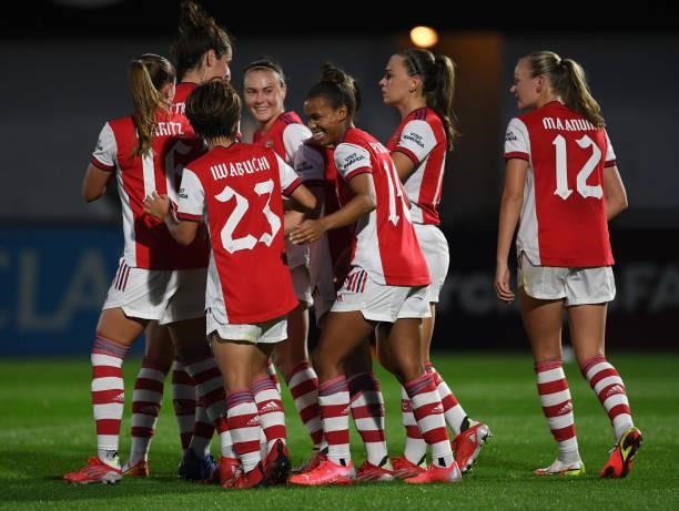 Kim Little celebrates scoring Arsenal's 2nd goal with Caitlin Foord and Nikita Parris and the rest of her team mates during the UEFA Women's...