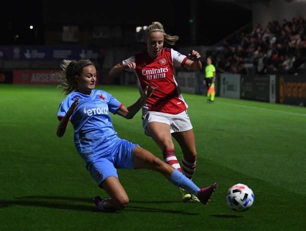 Beth Mead of Arsenal is challenged by Simona Necidova of Slavia Prague during the UEFA Women's Champions League match between Arsenal Women and...