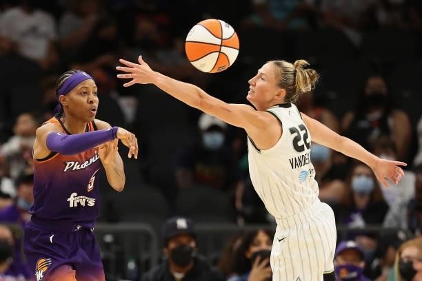 Shey Peddy of the Phoenix Mercury passes the ball around Courtney Vandersloot of the Chicago Sky during the first half of the WNBA game at the...