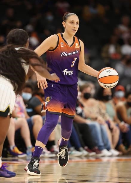 Diana Taurasi of the Phoenix Mercury handles the ball during the second half of the WNBA game against the Chicago Sky at the Footprint Center on...