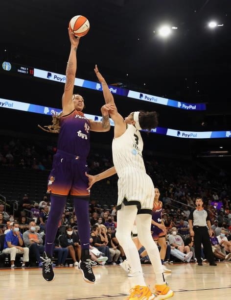 Brittney Griner of the Phoenix Mercury puts up a shot over Candace Parker of the Chicago Sky during the second half of the WNBA game at the Footprint...