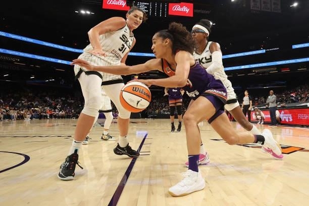 Skylar Diggins-Smith of the Phoenix Mercury drives the ball against Stefanie Dolson of the Chicago Sky during the second half of the WNBA game at the...