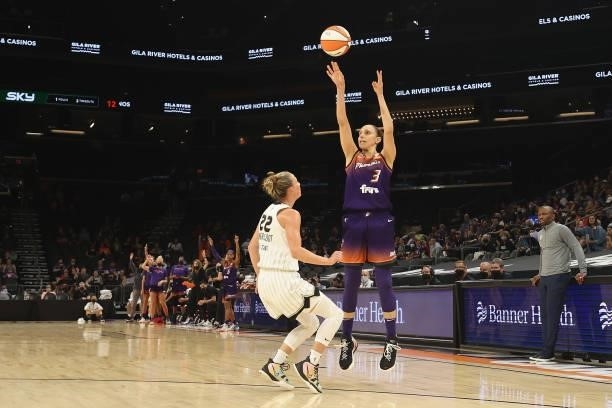 Diana Taurasi of the Phoenix Mercury puts up a three-point shot over Courtney Vandersloot of the Chicago Sky during the second half of the WNBA game...