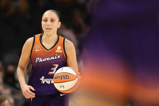 Diana Taurasi of the Phoenix Mercury handles the ball against the Chicago Sky during the second half of the WNBA game at the Footprint Center on...