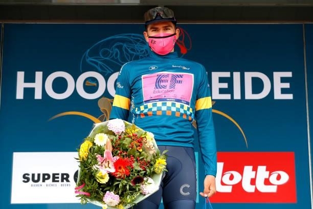 Stefan Bissegger of Switzerland and Team EF Education - Nippo celebrates winning the Blue Leader Jersey on the podium ceremony after the 17th Benelux...