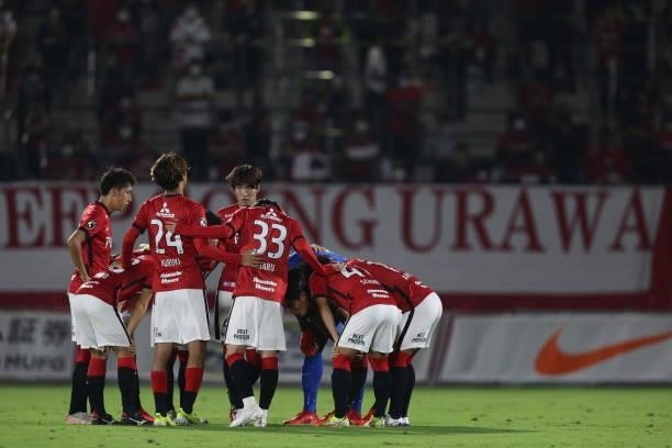 Urawa Reds players line up for the team photos prior to the J.League YBC Levain Cup quarter final first leg between Urawa Red Diamonds and the Urawa...