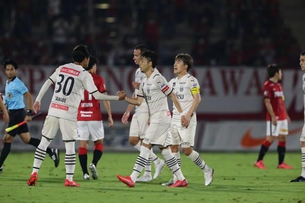 Kawasaki Frontale players react after their 1-1 draw after the J.League YBC Levain Cup quarter final first leg between Urawa Red Diamonds and the...