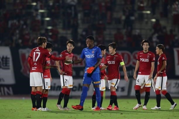 Urawa Reds players react after their 1-1 draw after the J.League YBC Levain Cup quarter final first leg between Urawa Red Diamonds and the Urawa...