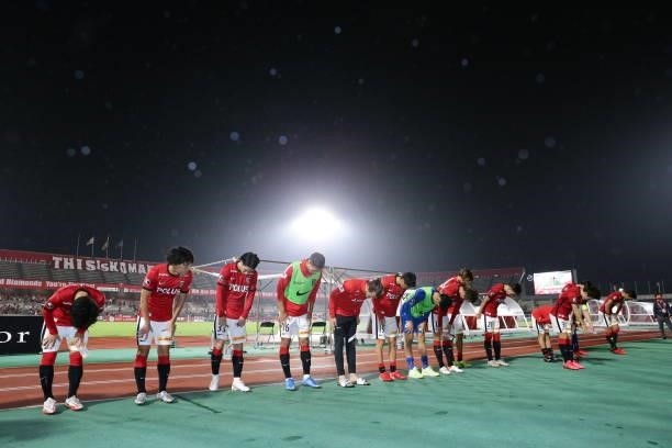 Urawa Reds players applaud fans after the J.League YBC Levain Cup quarter final first leg between Urawa Red Diamonds and the Urawa Komaba Stadium on...