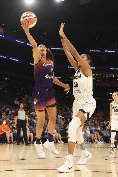 Skylar Diggins-Smith of the Phoenix Mercury attempts a shot ahead of Azurá Stevens of the Chicago Sky during the second half of the WNBA game at the...