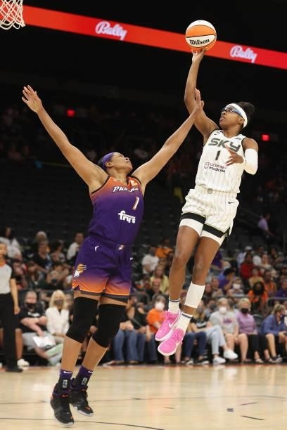 Diamond DeShields of the Chicago Sky attempts a shot over Brittney Griner of the Phoenix Mercury during the first half of the WNBA game at the...