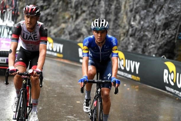 Matteo Trentin of Italy and UAE Team Emirates and Andrea Bagioli of Italy and Team Deceuninck - Quick-Step compete during the 76th Tour of Spain...