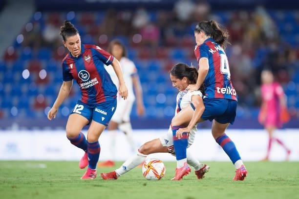 Majri of Lyon competes for the ball with Maria Mendez of Levante UD during the UEFA Women's Champions League match between Levante UD and Lyon at...