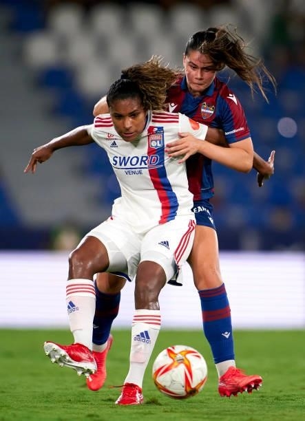 Maria Mendez of Levante UD competes for the ball with Catarina Macario of Lyon during UEFA Women's Champions League Round 2 match between Levante UD...