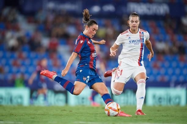 Nuria Mendoza of Levante UD being followed by Bruun of Lyon during the UEFA Women's Champions League match between Levante UD and Lyon at Ciutat de...