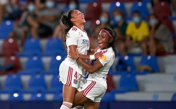 Perle Morroni of Lyon celebrates after scoring her team's second goal with her teammate Selma Bacha during UEFA Women's Champions League Round 2...